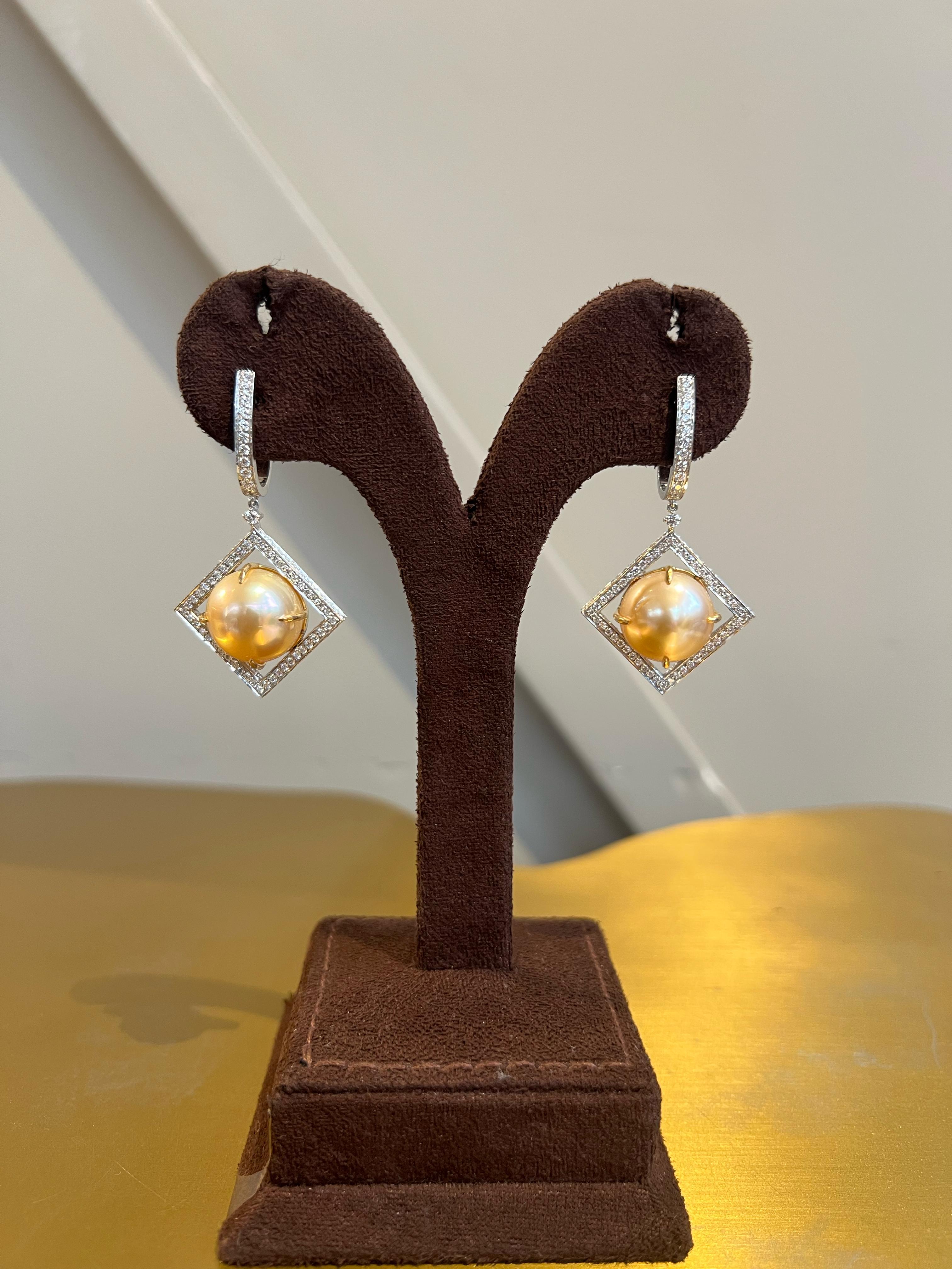 Dazzling pearl hangings studded with Diamonds